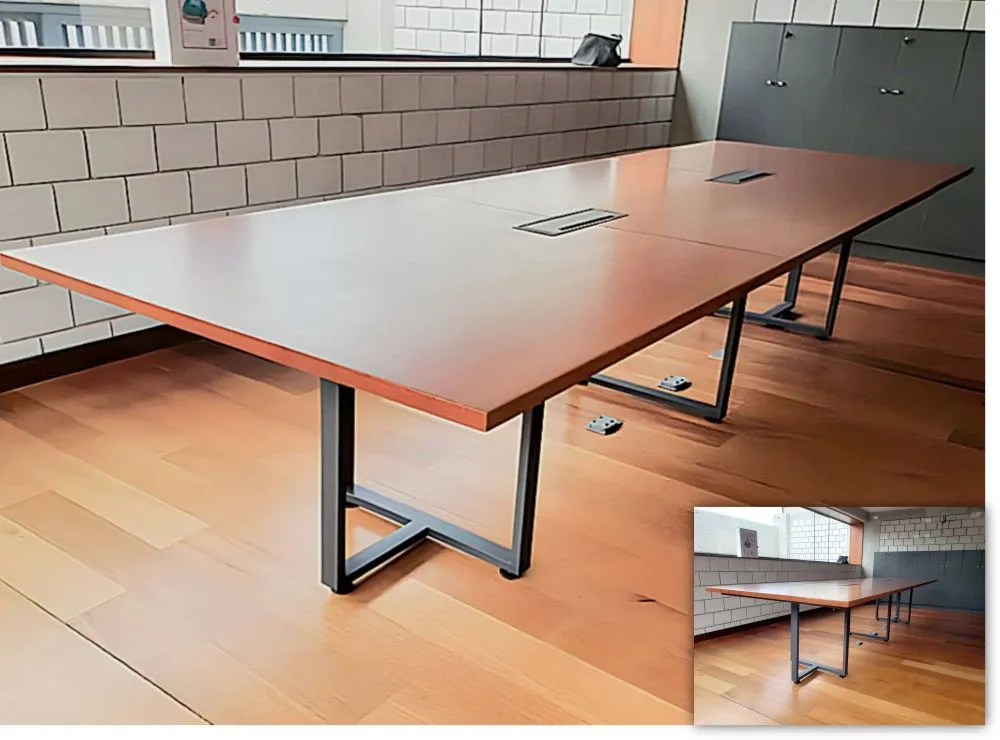 Mesa con tablero enchapado en lamina de madera y bases metalicas tipo O.